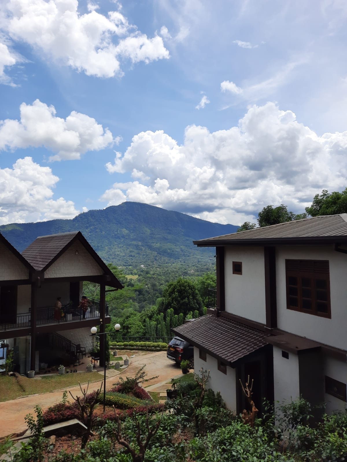 Terrace Cinnamon View chalet-style buildings with mountain backdrop