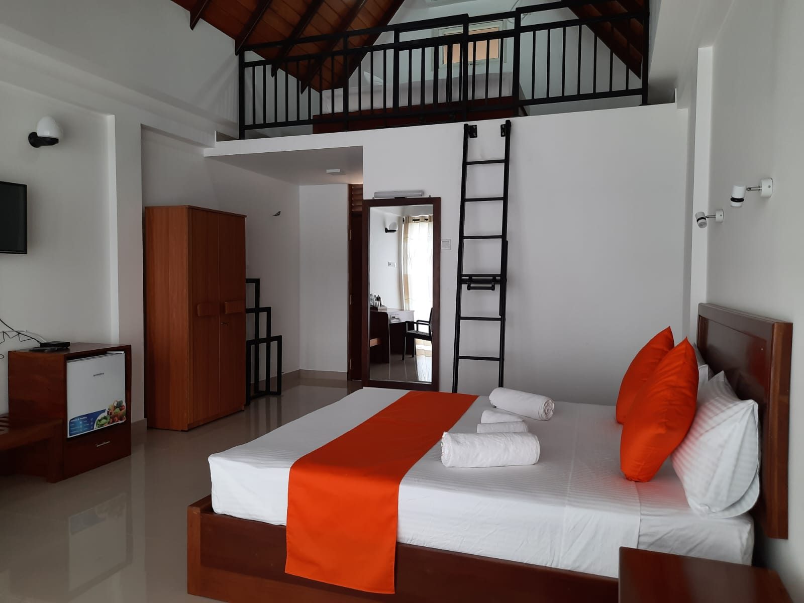 Terrace Cinnamon View loft room interior with mezzanine, orange theme
